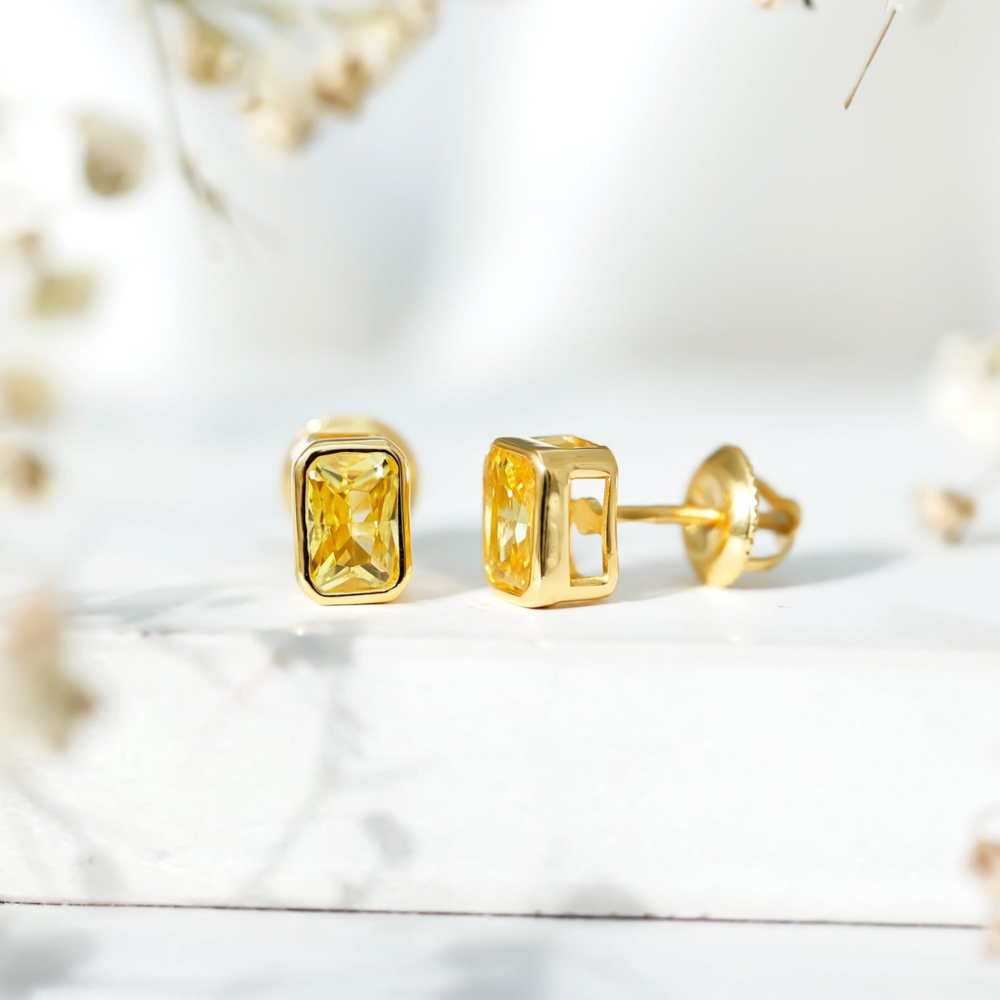 Certified 1.5 Carat Emerald Cut Lab Grown Yellow Sapphire Stud Earrings